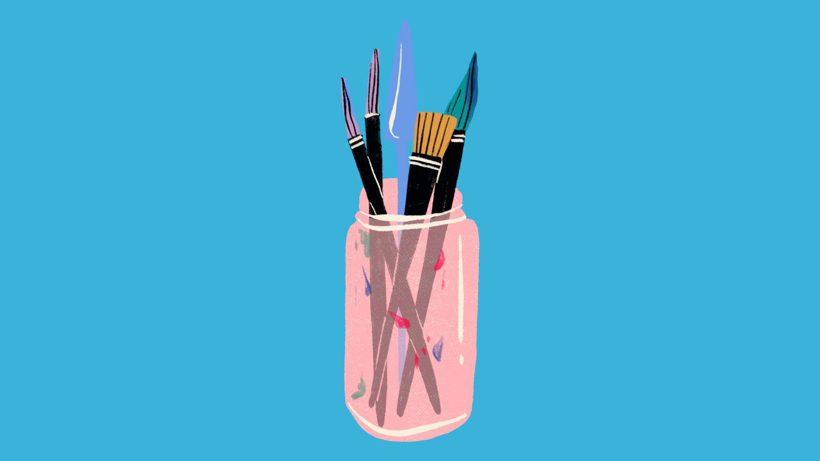 A jar of paint brushes