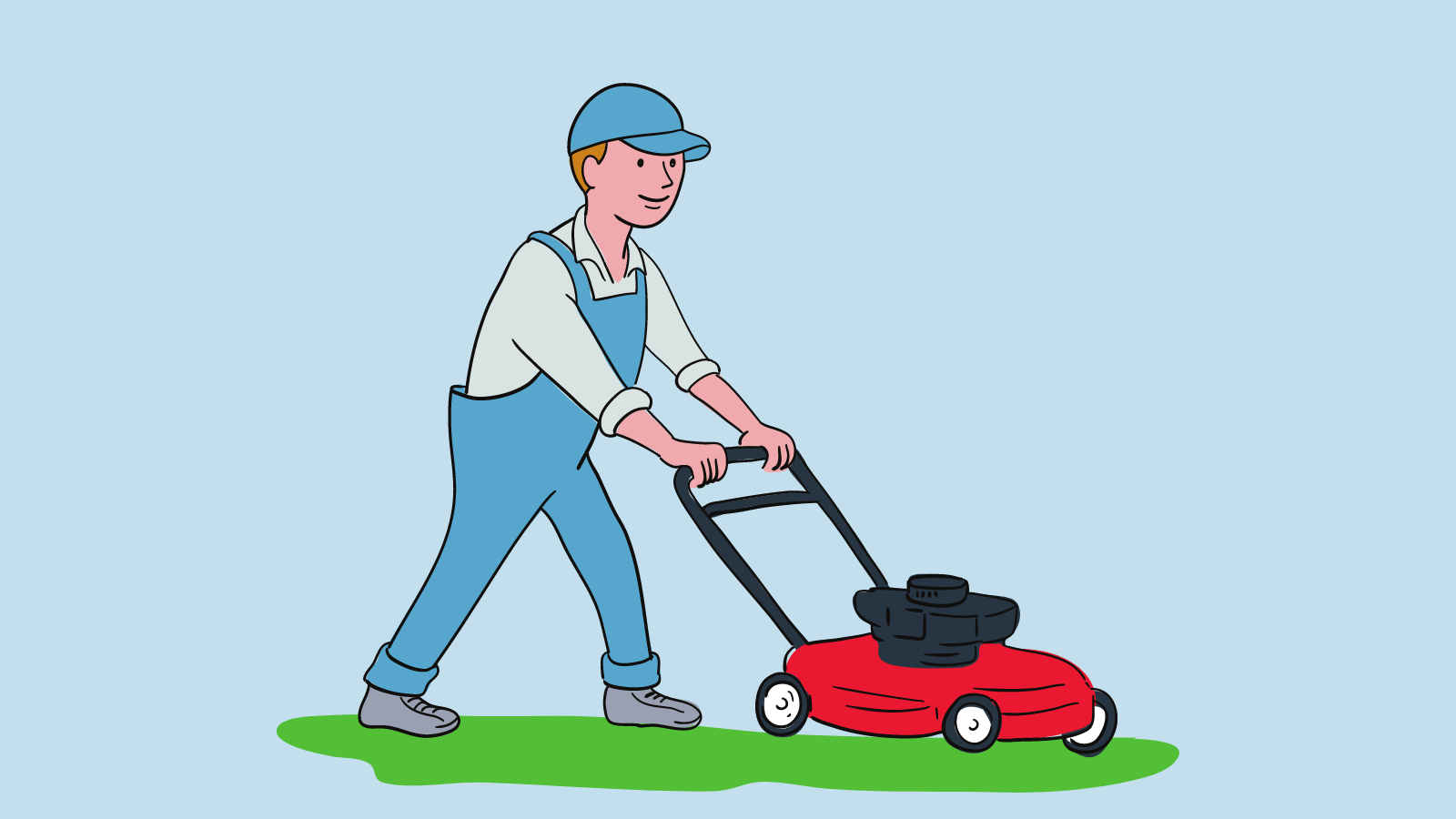 A man pushing a lawn mower