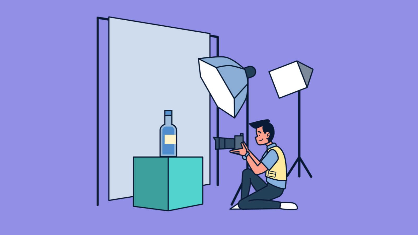 A photographer in a studio kneeling down and taking a photo of a bottle