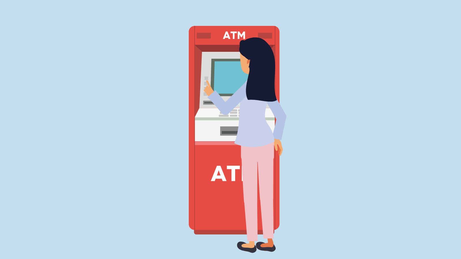 A woman using an ATM