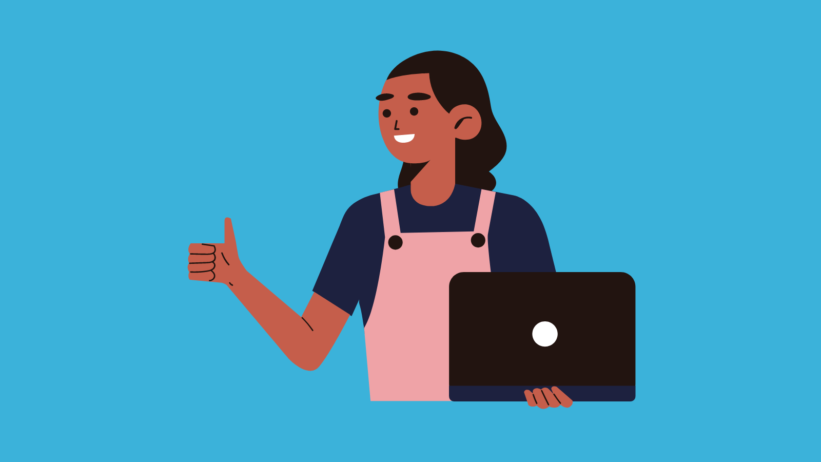 A young woman holding a laptop and flashing a thumbs up