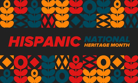 red, blue, black, orange patterned background with a sign that says "Hispanic national heritage month"