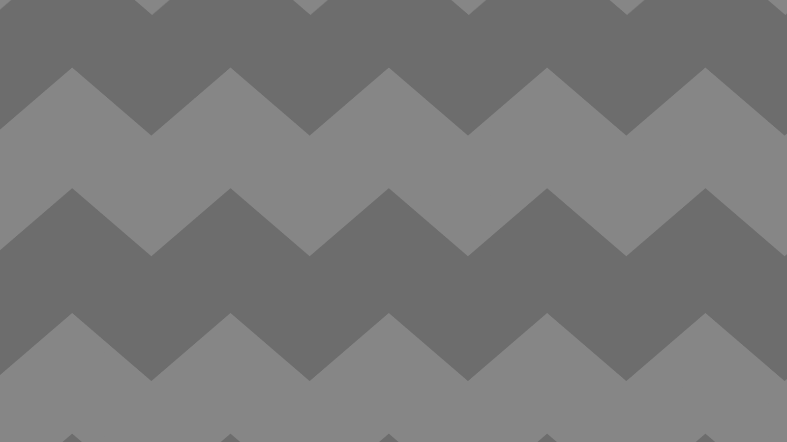 A grey chevron background