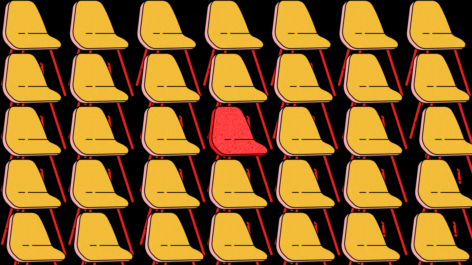 Rows of yellow chairs with one red chair