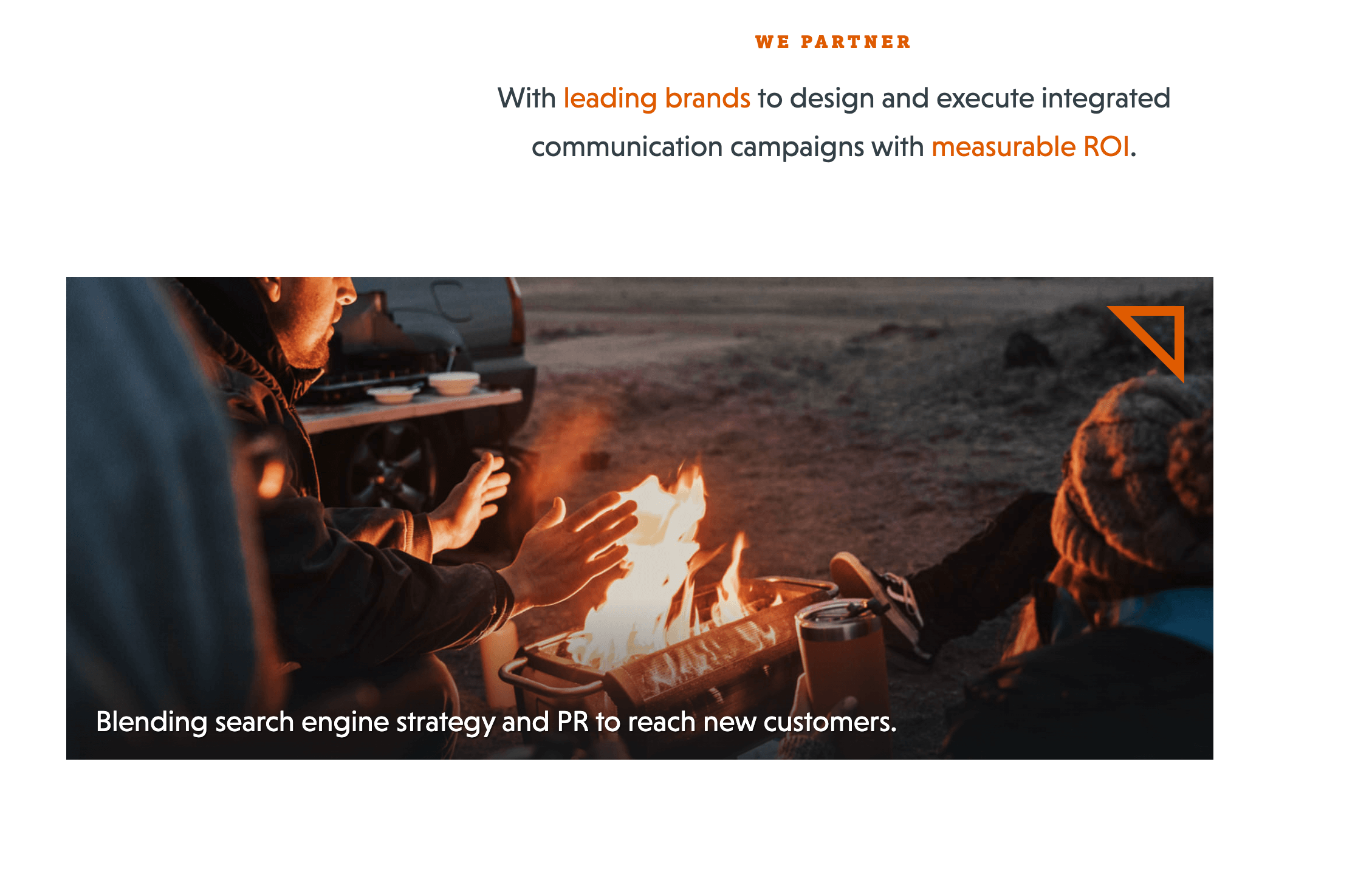 Purple Orange's About section, featuring an image of people around a campfire at night
