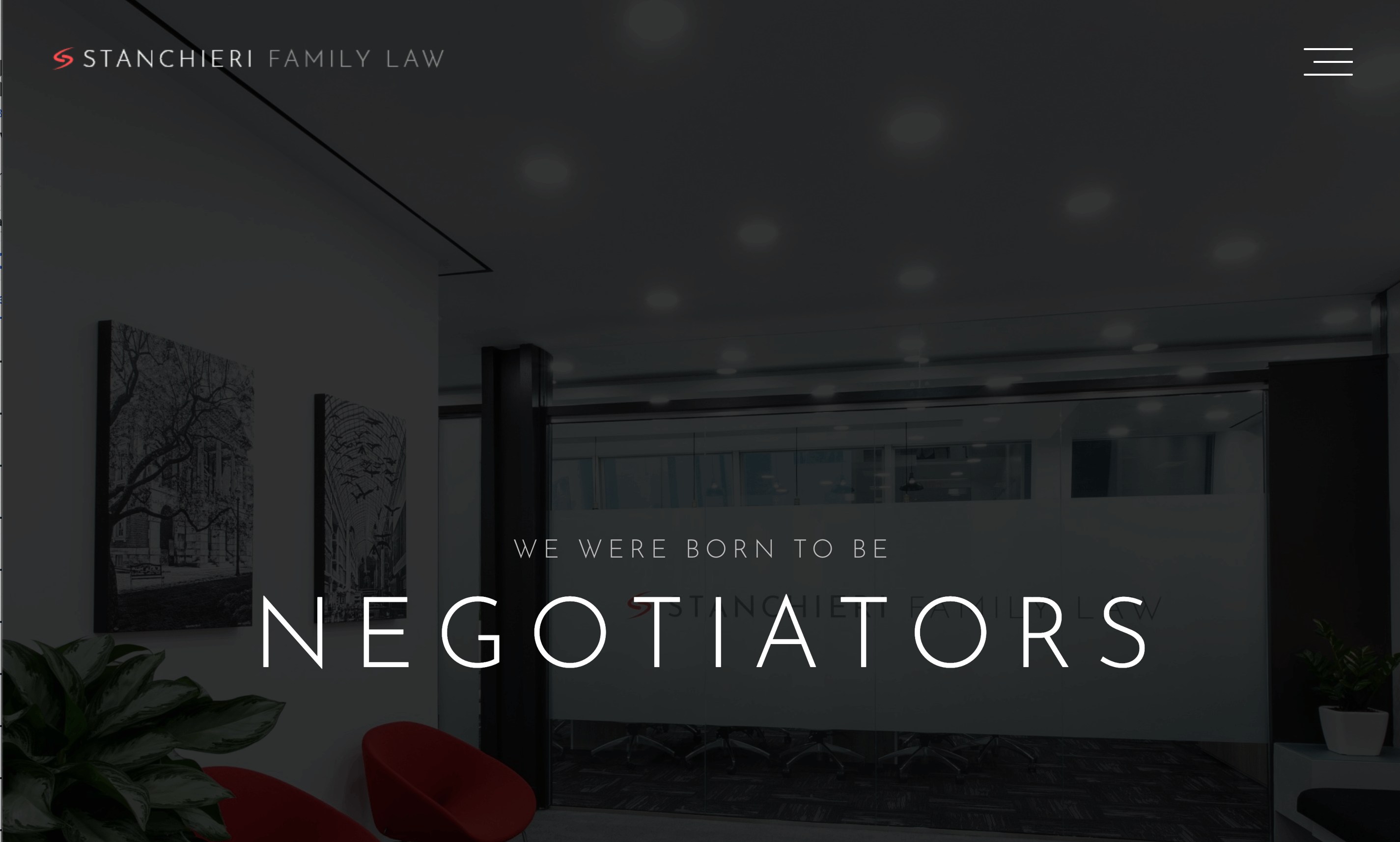 Stanchieri Family Law's website featuring the slogan "we were born to be negotiators" over a picture of the inside of their office