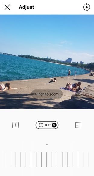 A demonstration of the Adjust feature with a picture of Lake Michigan on a clear day