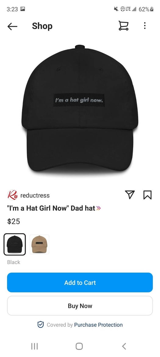 A shoppable post for a black baseball cap that says "I'm a hat girl now"