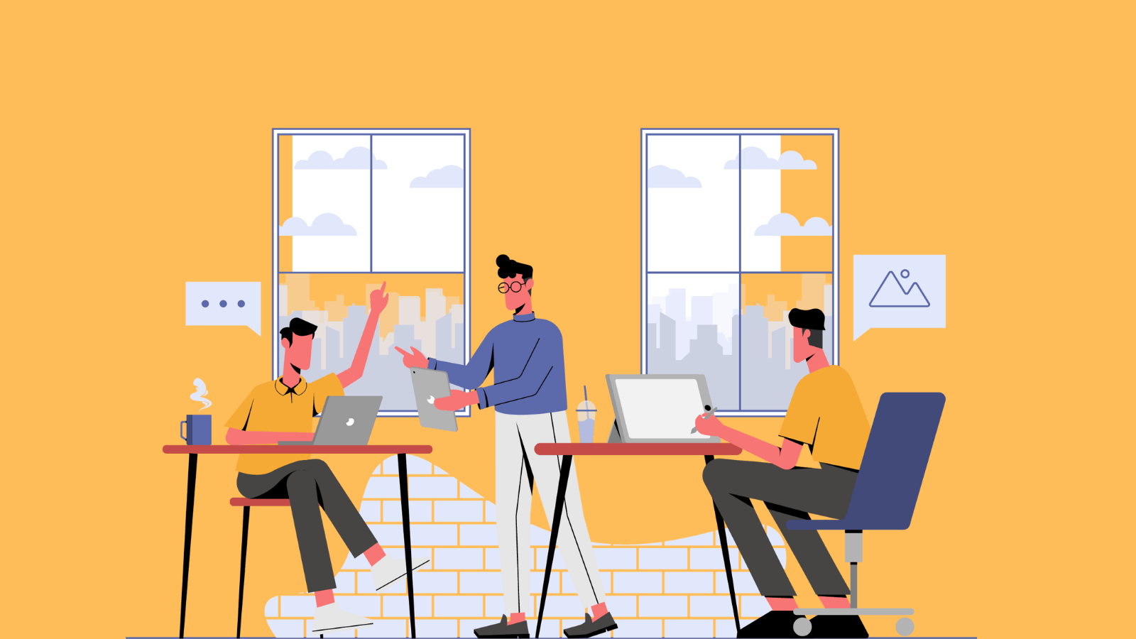 Three people working in an office
