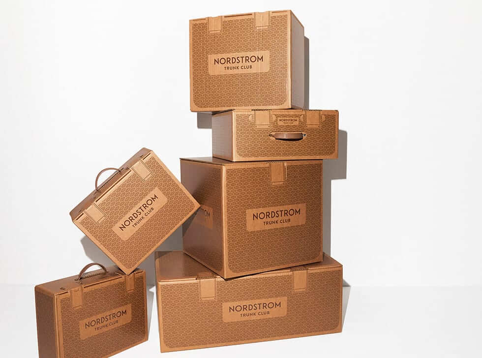 Trunk Club shipping boxes, which are decorated to look like old-fashioned trunks
