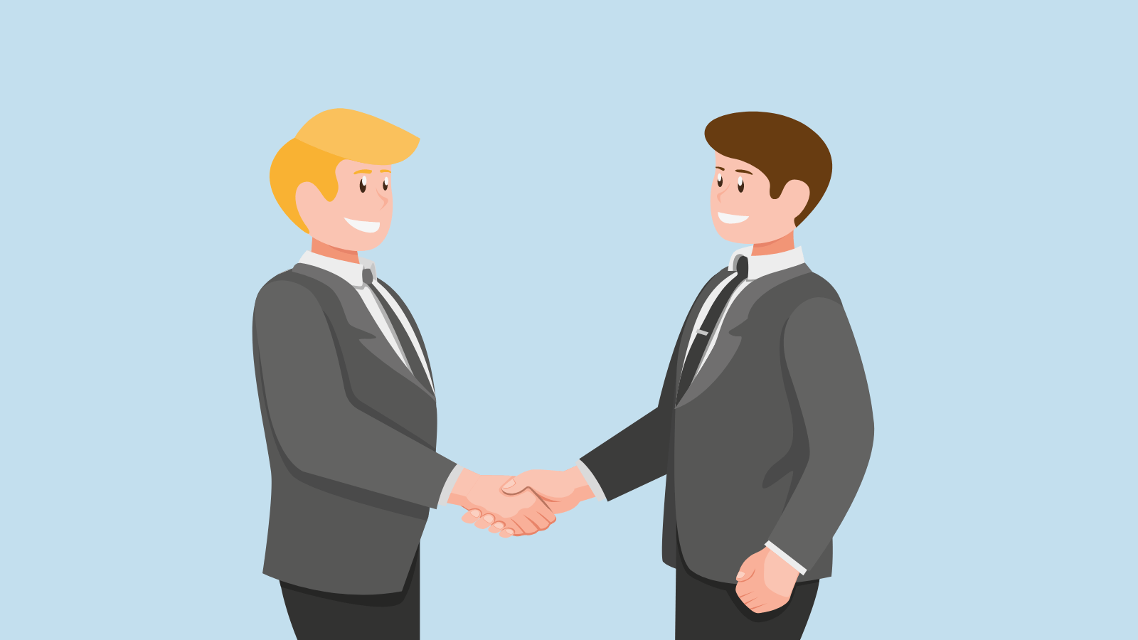 Two men in business suits shaking hands