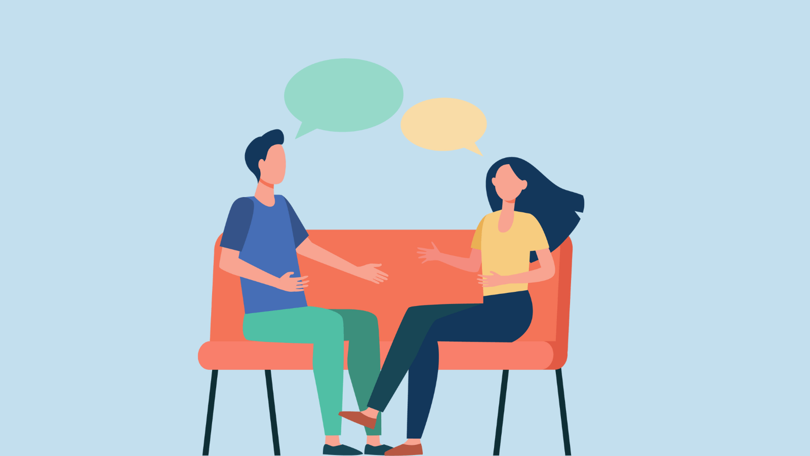 Two people on a couch talking