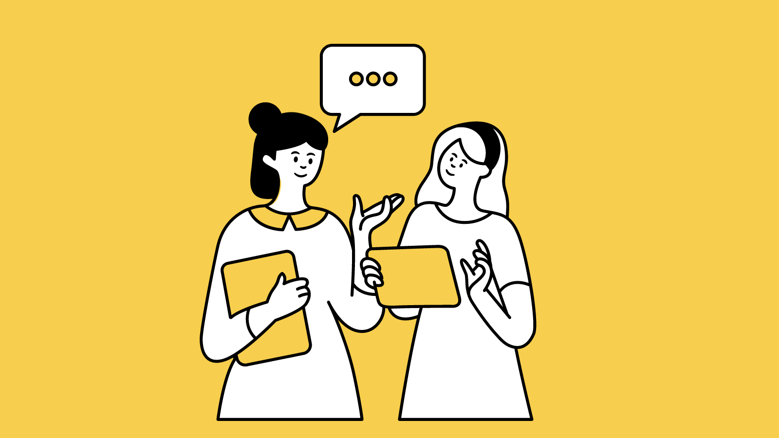Two women holding clipboards in conversation