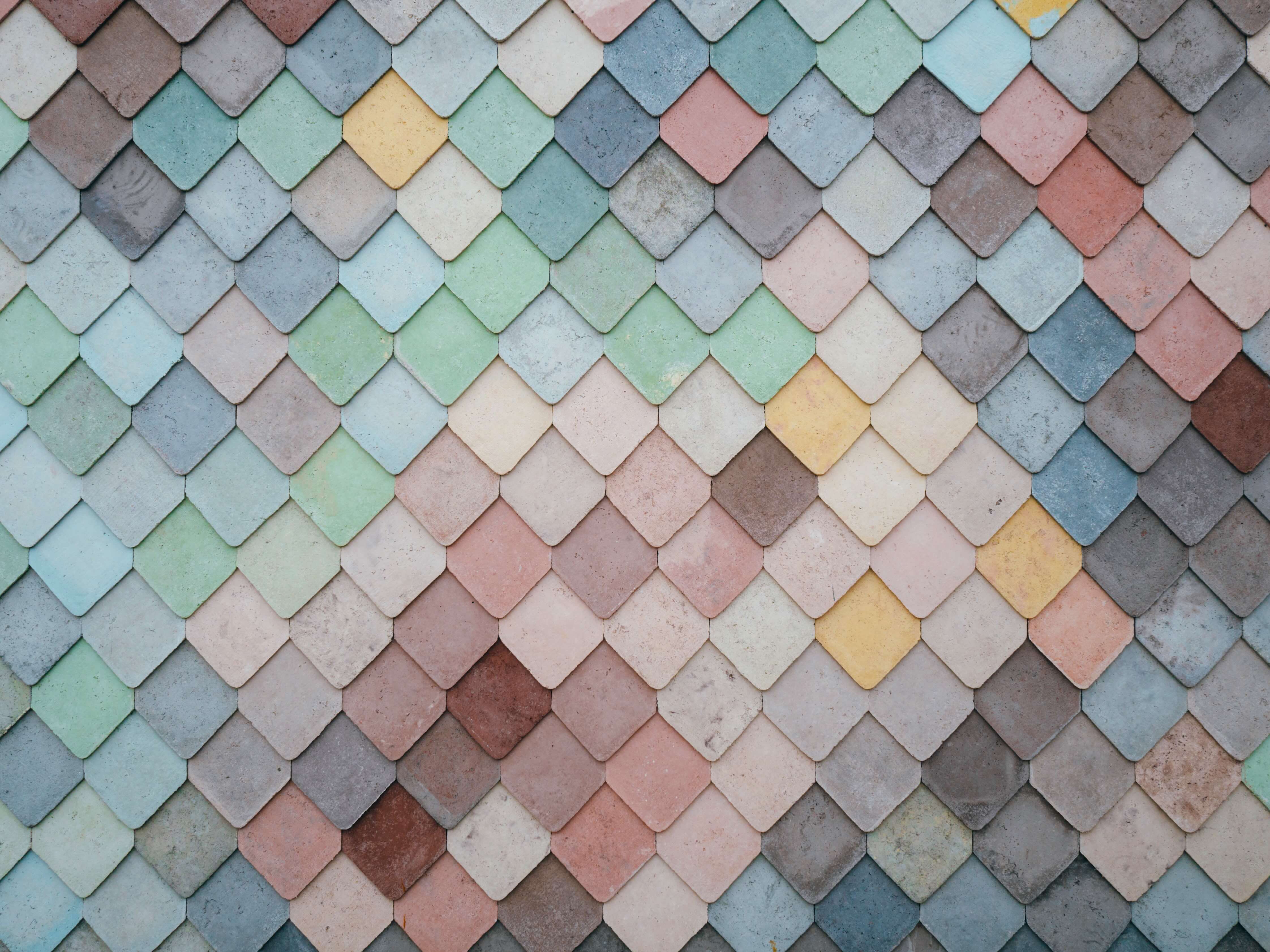 Shingles that look like fish scales in various pastel colors