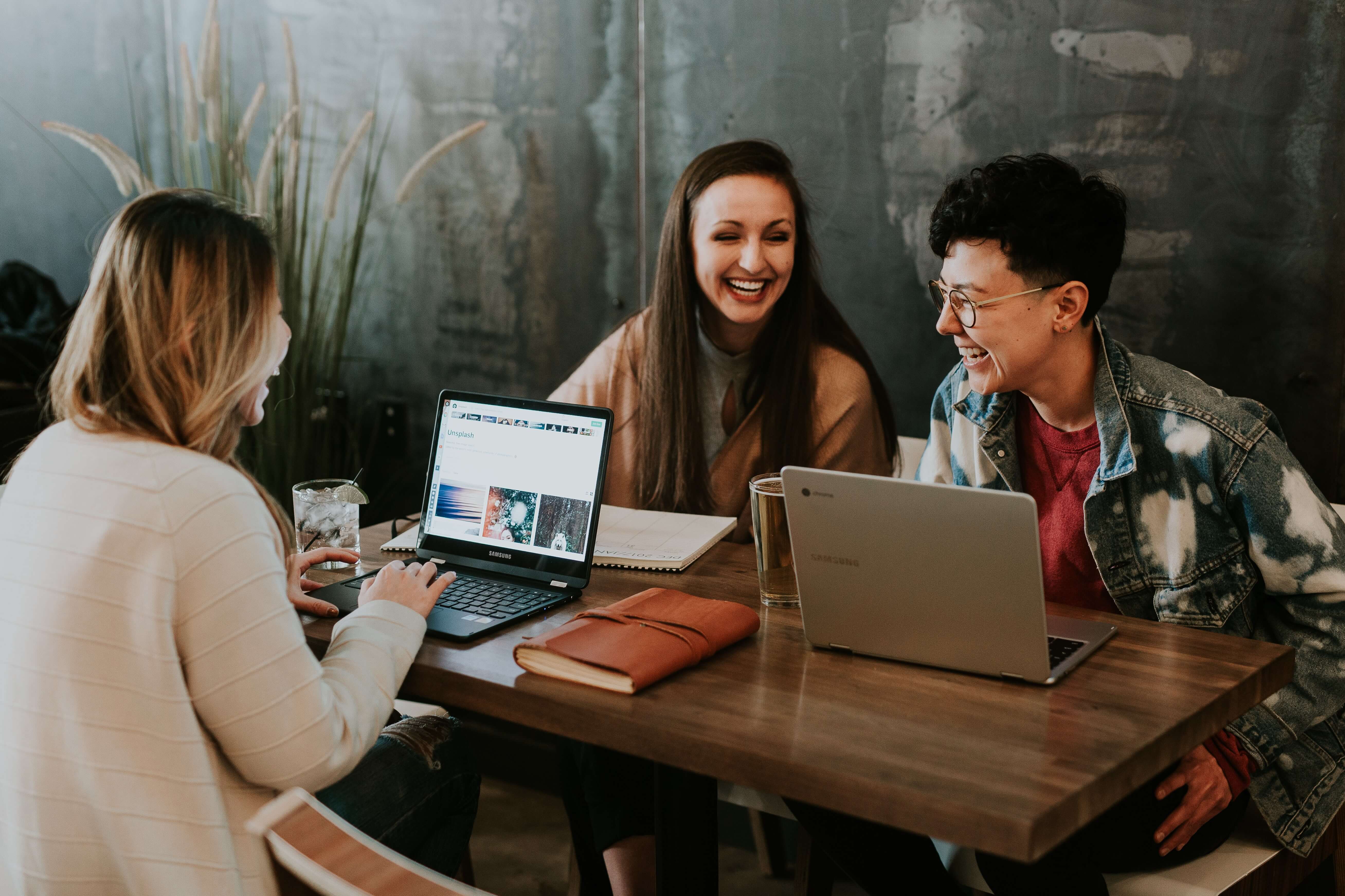 Three students woking on a group project