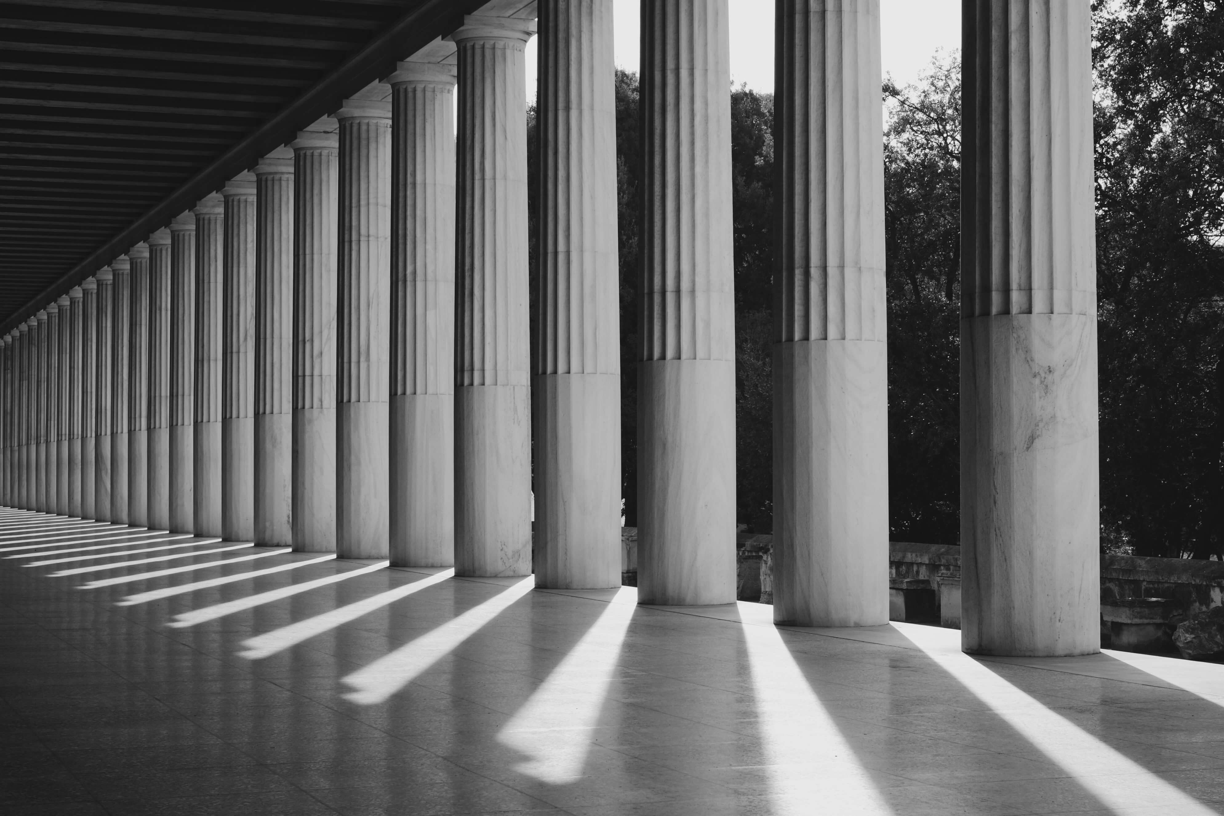 Greek-style columns in black and white