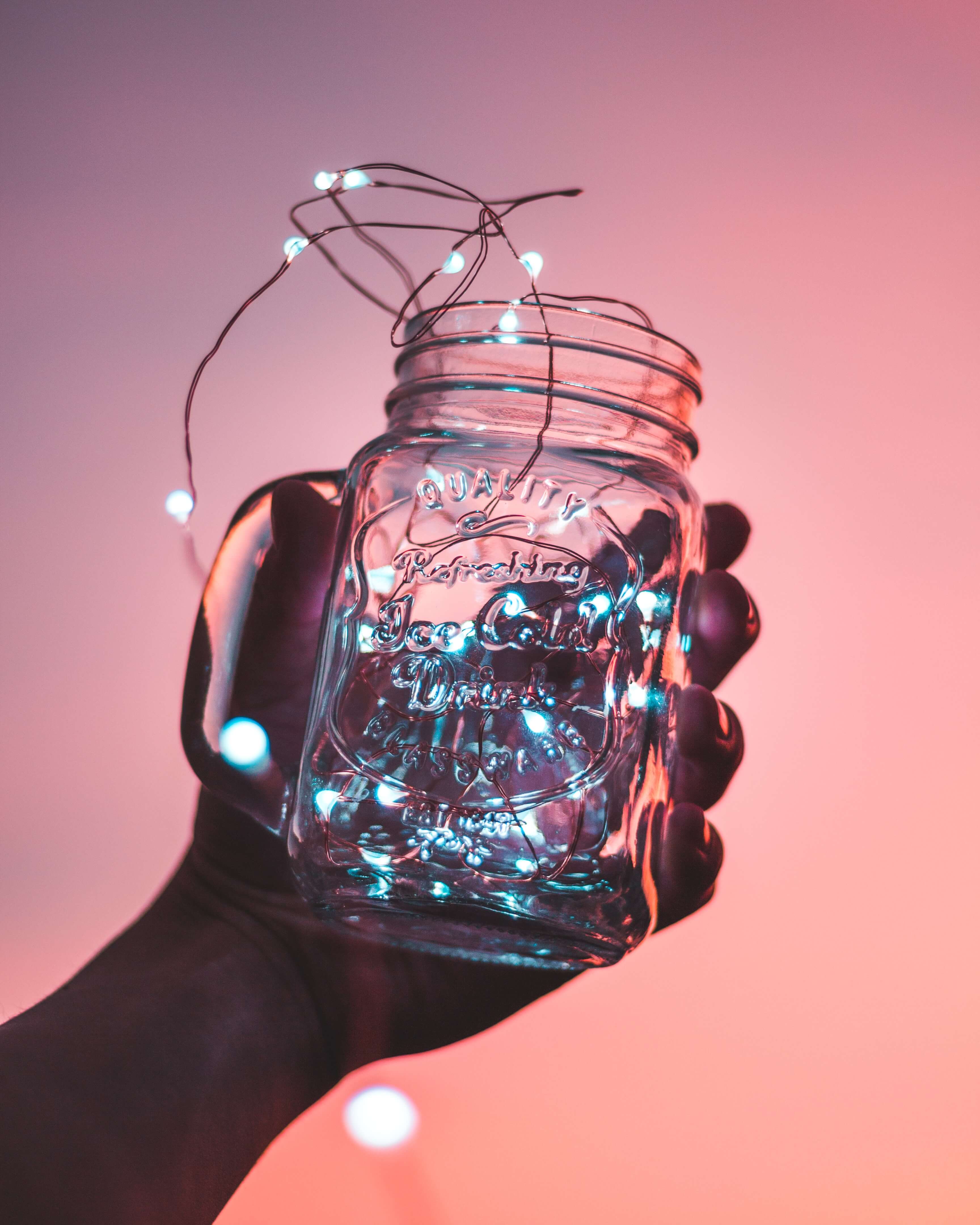 A mason jar full of string lights