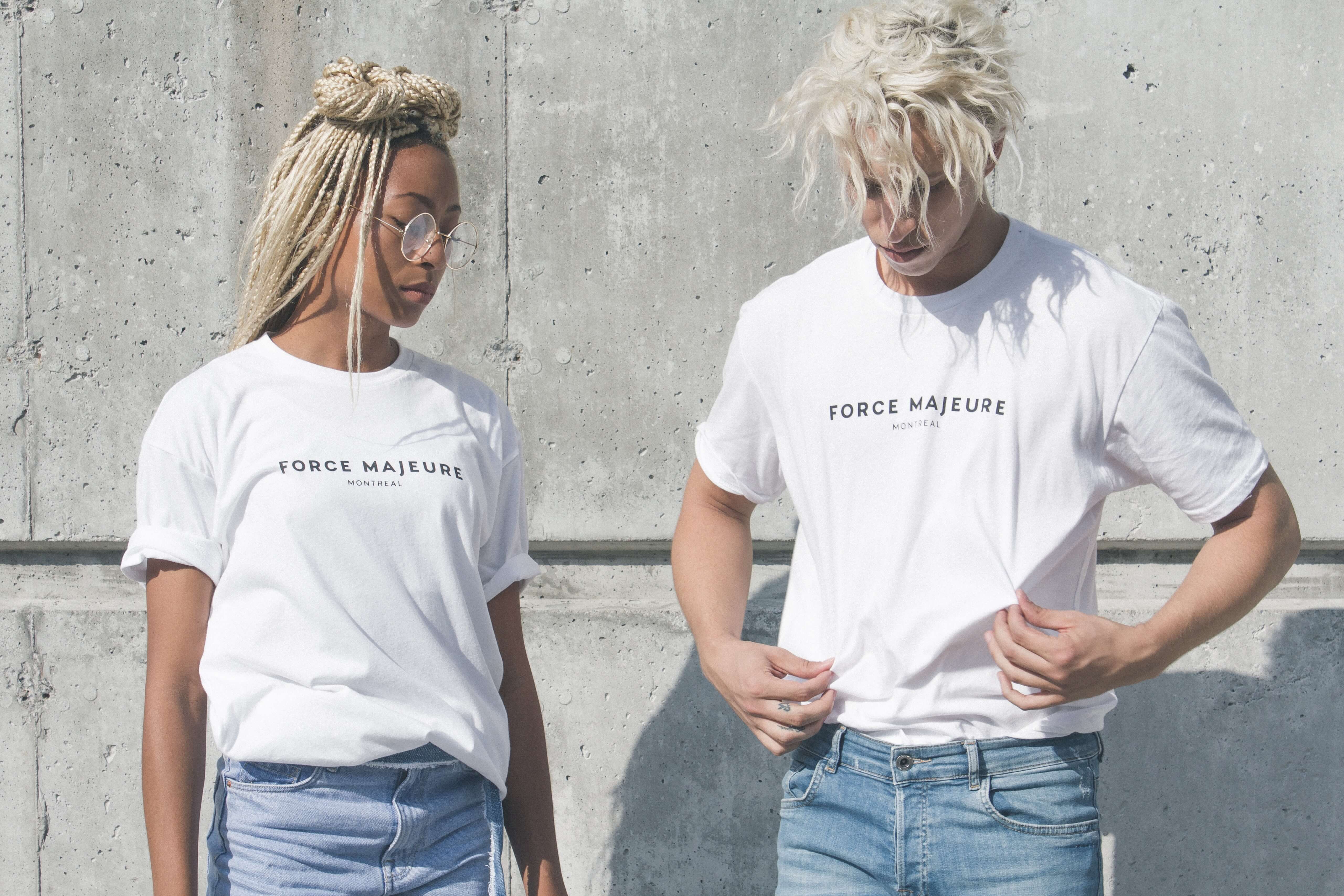 Two models wearing Force Majeure Montreal T-shirts