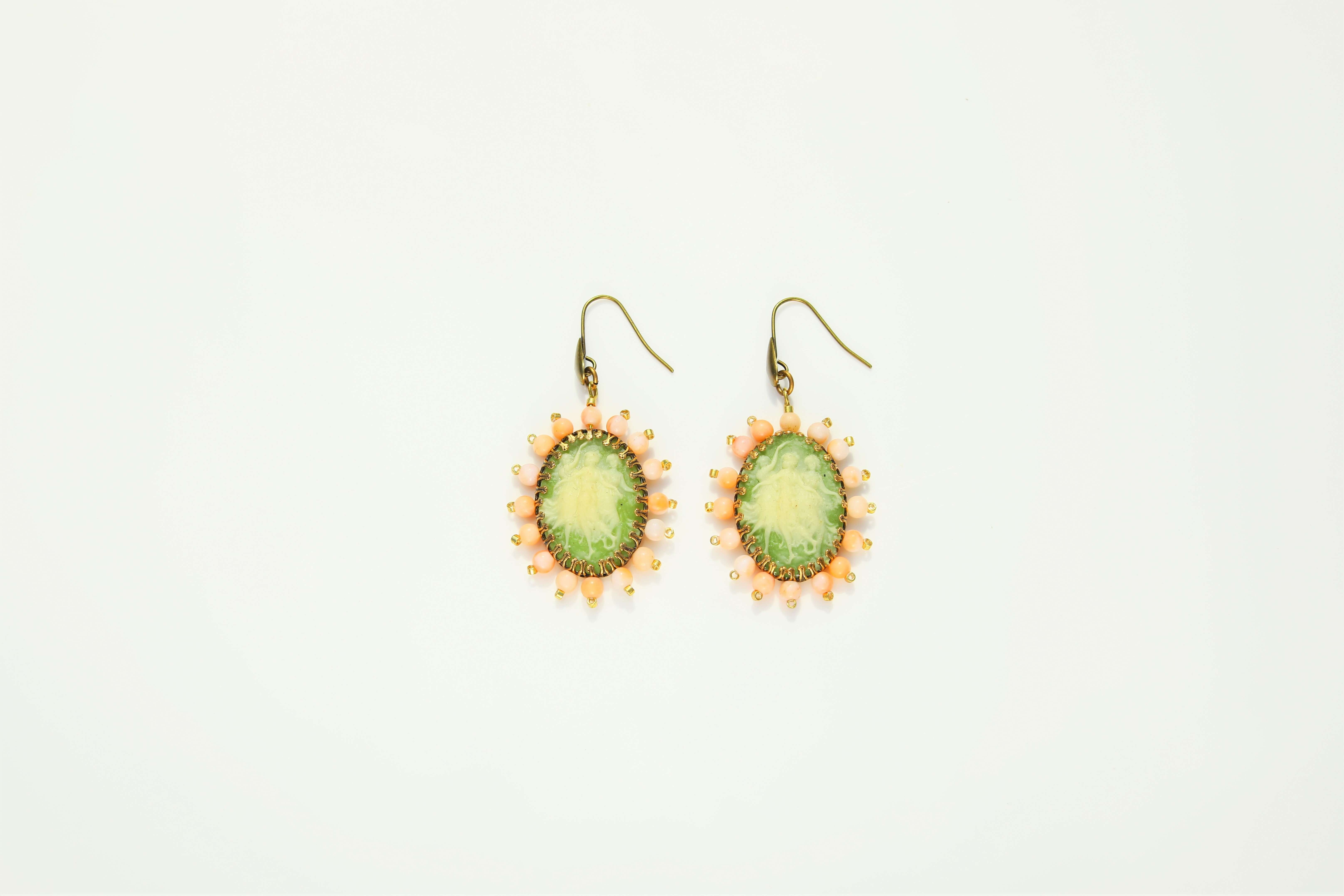 Earrings made of green and pink resin