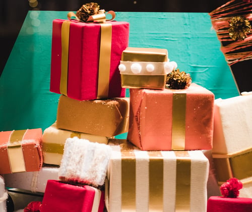 Lots of colorful presents in a pile