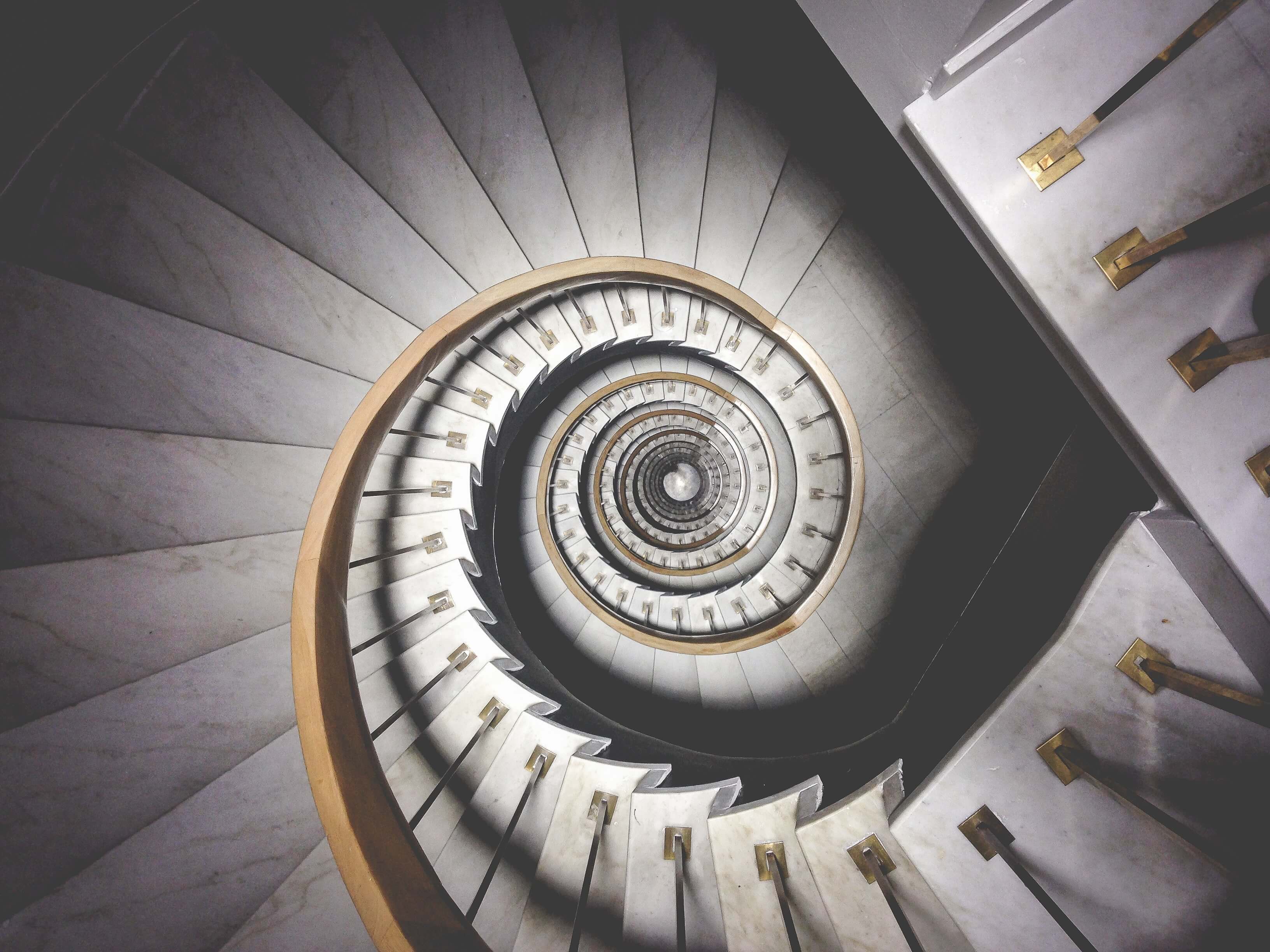 A shot from above of a spiral staircase