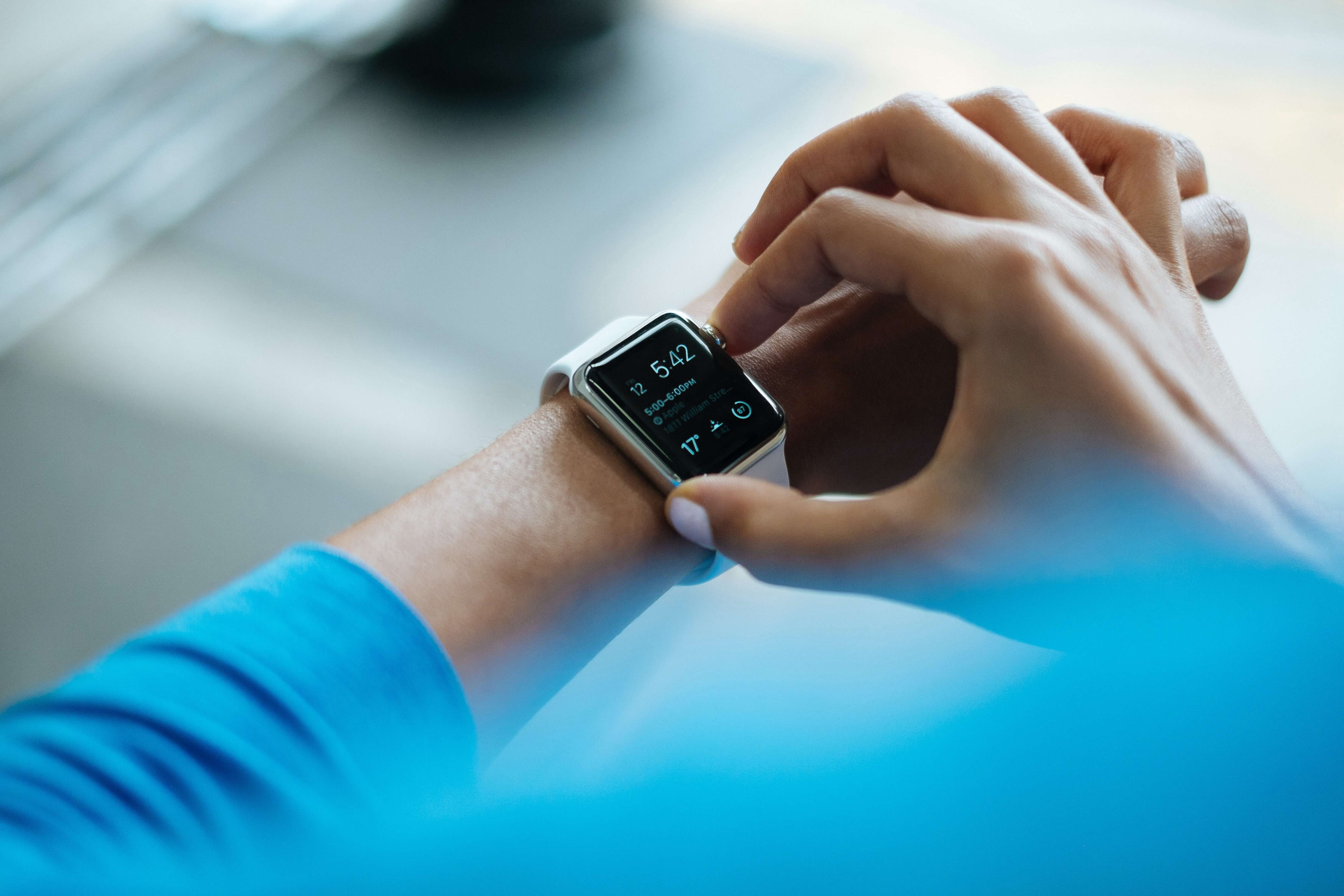 Closeup of someone's wrist as they check their Apple Watch