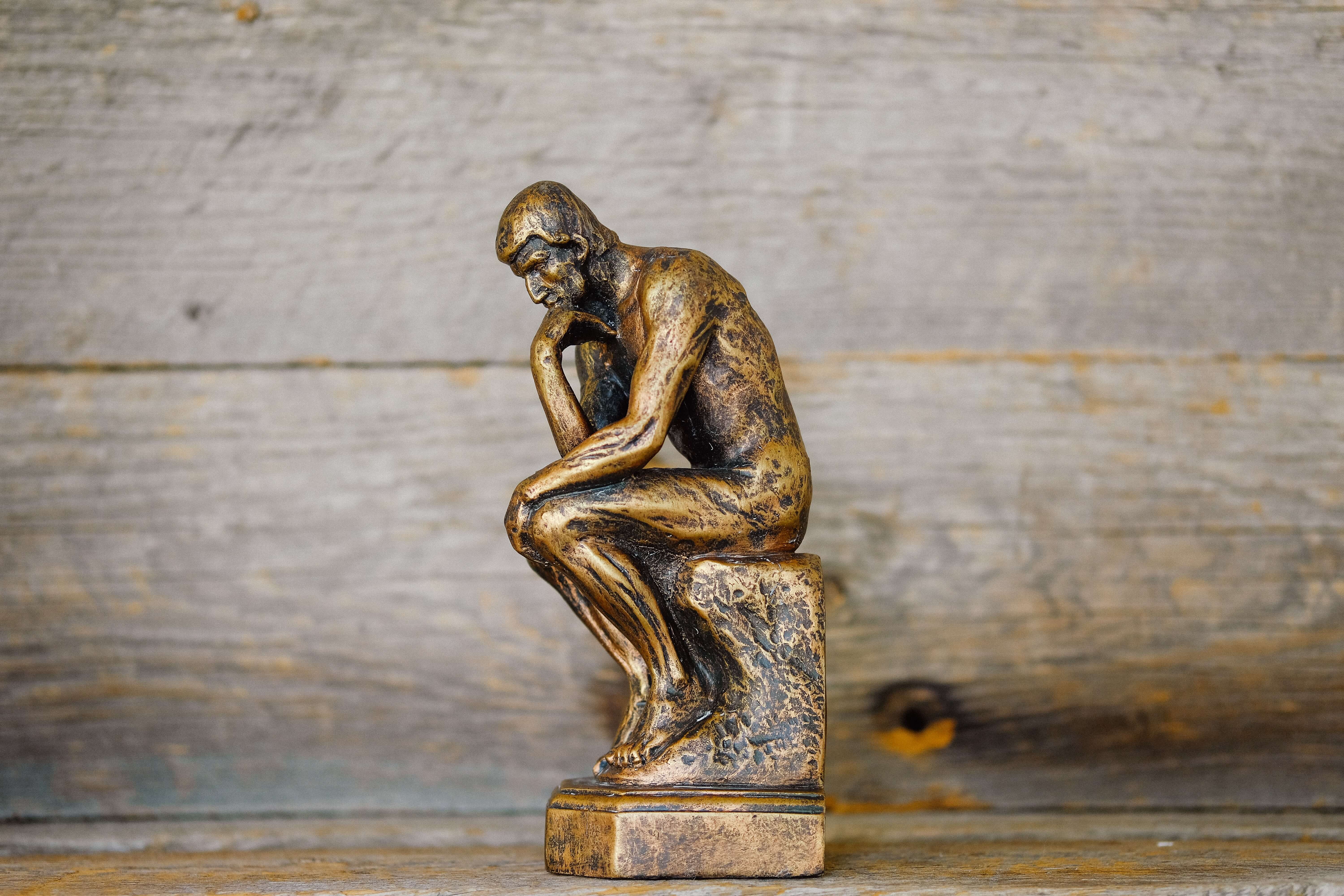 A bronze miniature of the Thinker statue