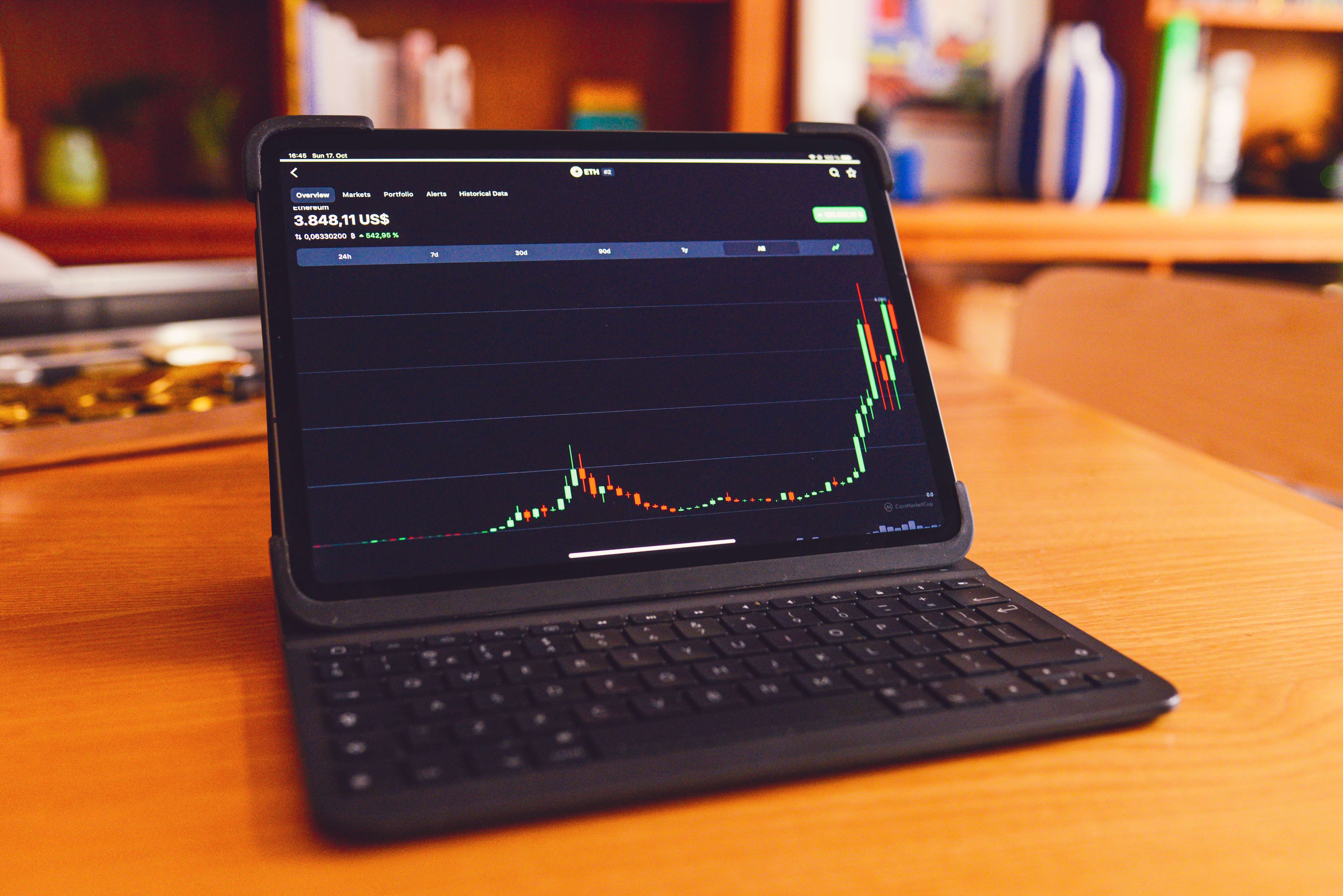 A laptop with a stock tracker open