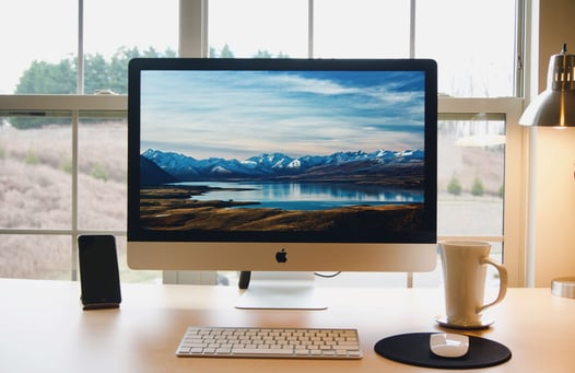 imac with a mountain background.