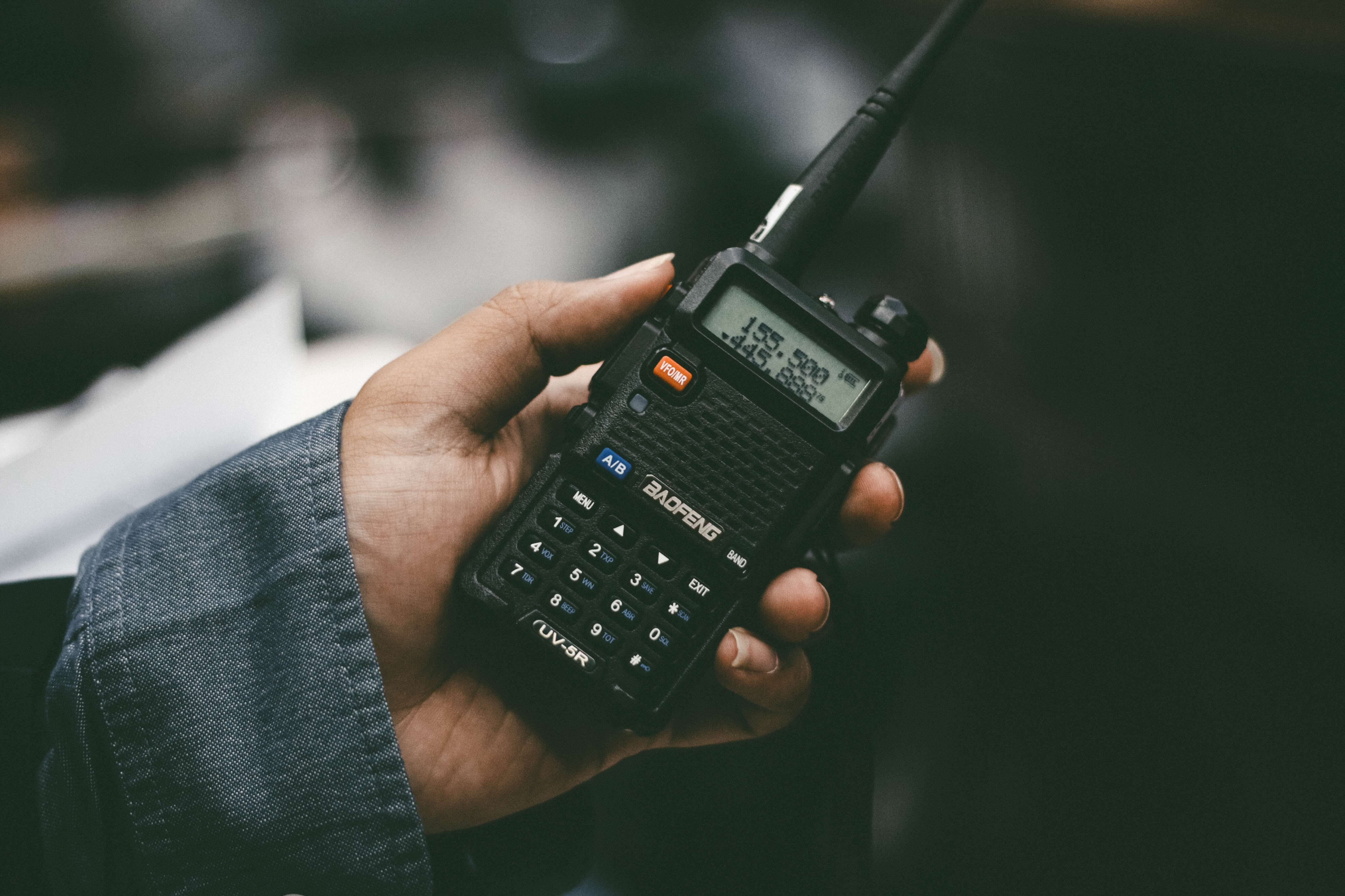 A person using a walkie talkie