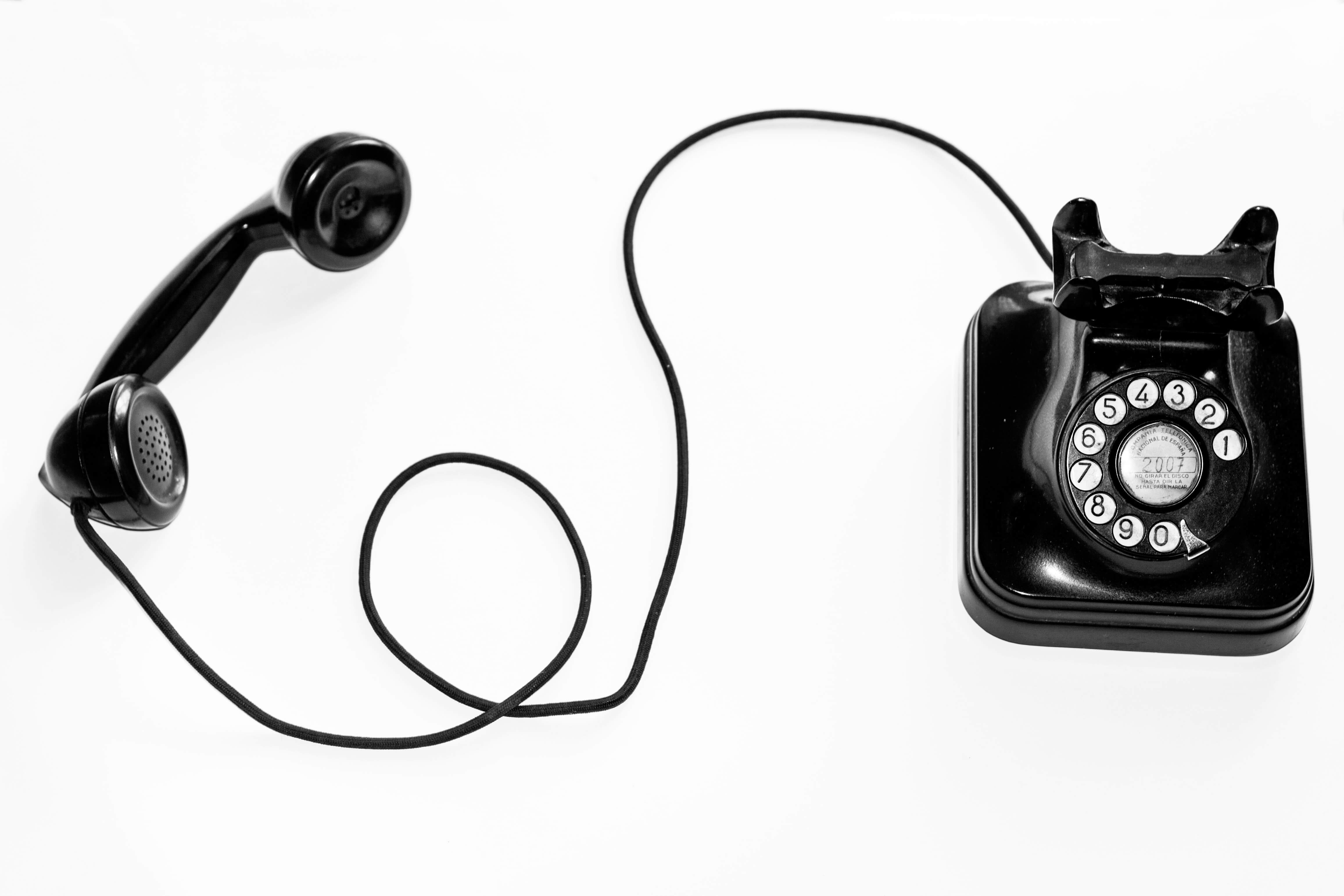 A black rotary phone