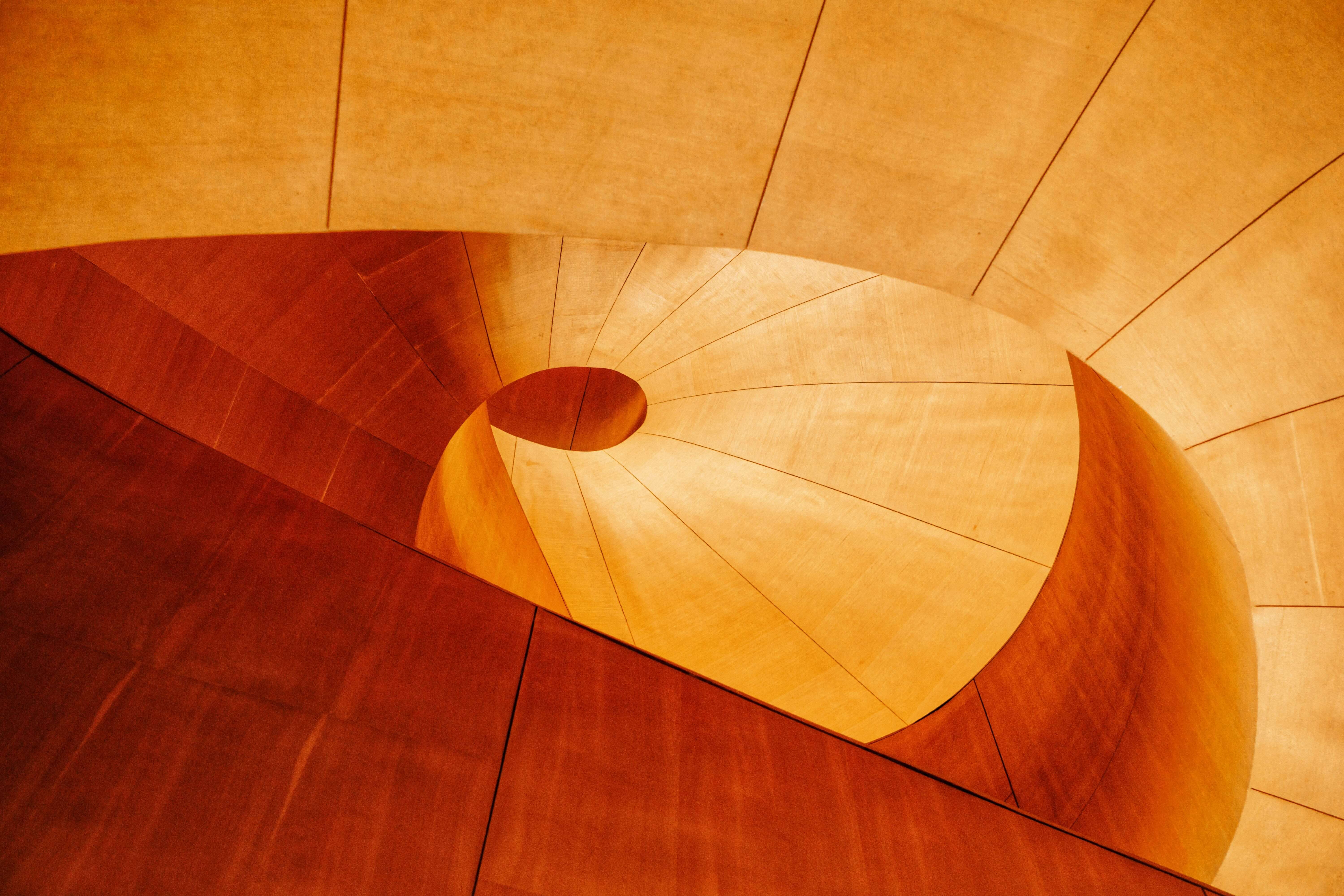 A downward view of a spiral staircase