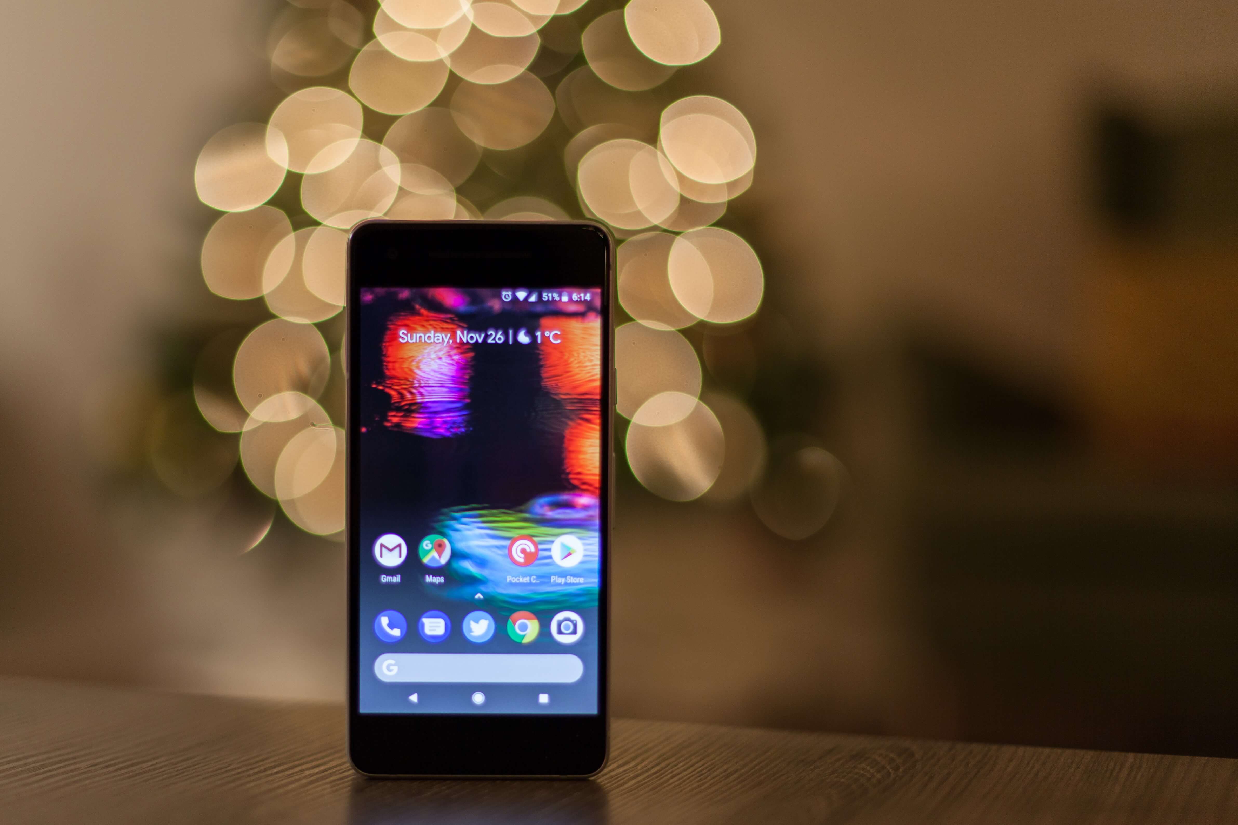 A smartphone turning on Christmas lights