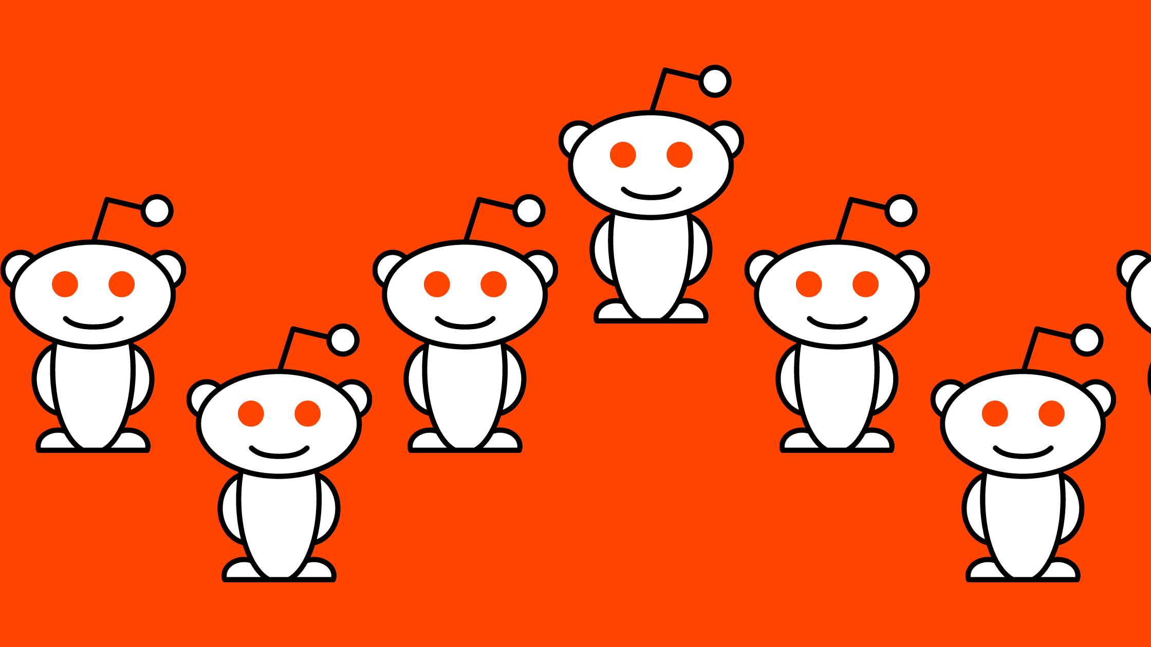 Reddit's alien mascot in a repeating pattern