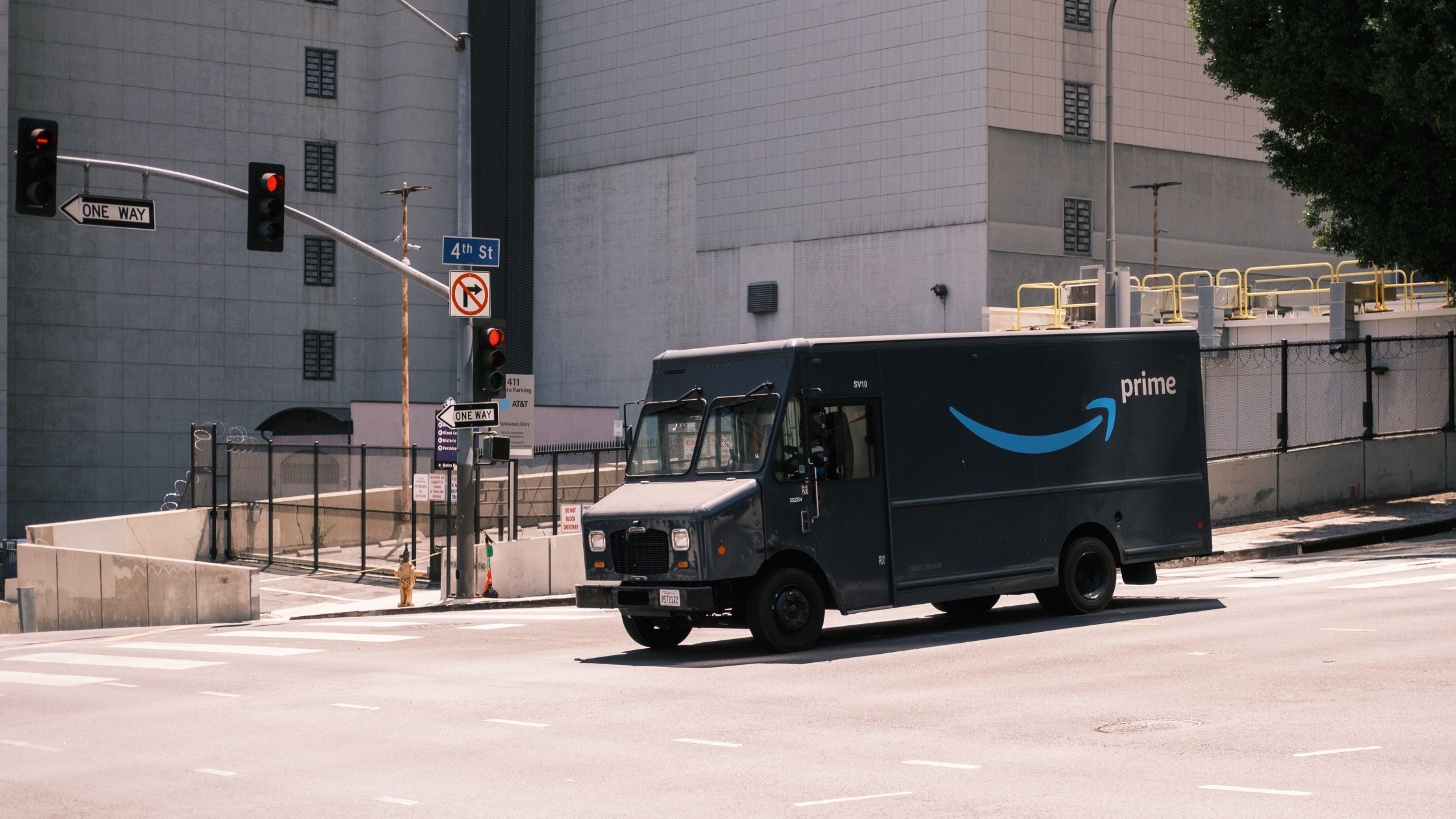 An Amazon Prime truck stops at an intersection
